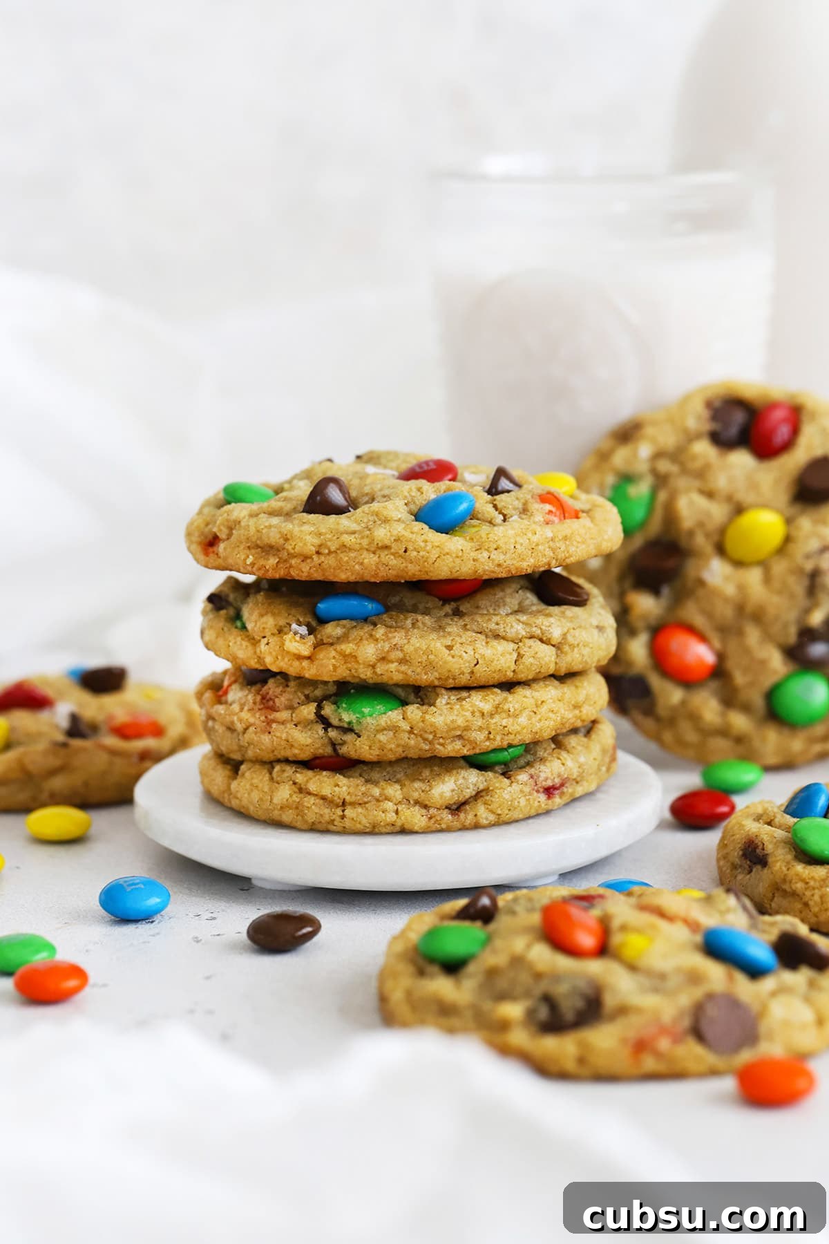 Soft Chewy Gluten-Free M&M Cookies recipe 6 Front view of gluten-free m&m cookies in a stack