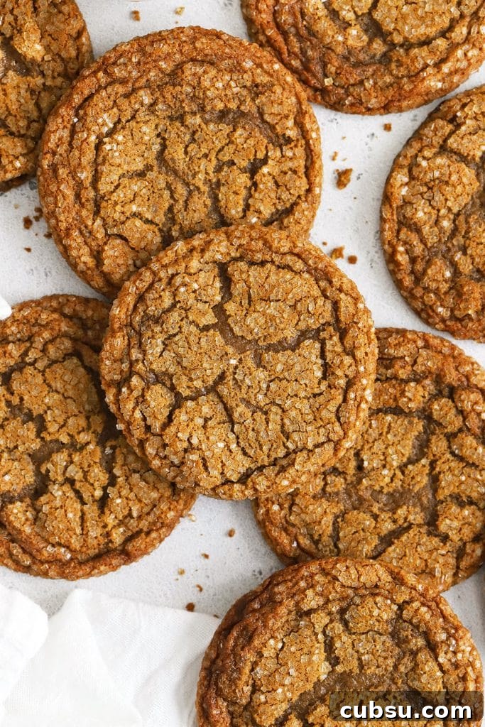 Soft Chewy Gluten-Free M&M Cookies recipe 10 chewy gluten-free molasses cookies on a white background