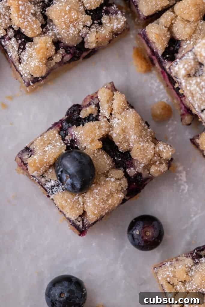 Chewy Blueberry Blondies Recipe with Lemon Glaze 13 close up shot of the blueberry blondies recipe