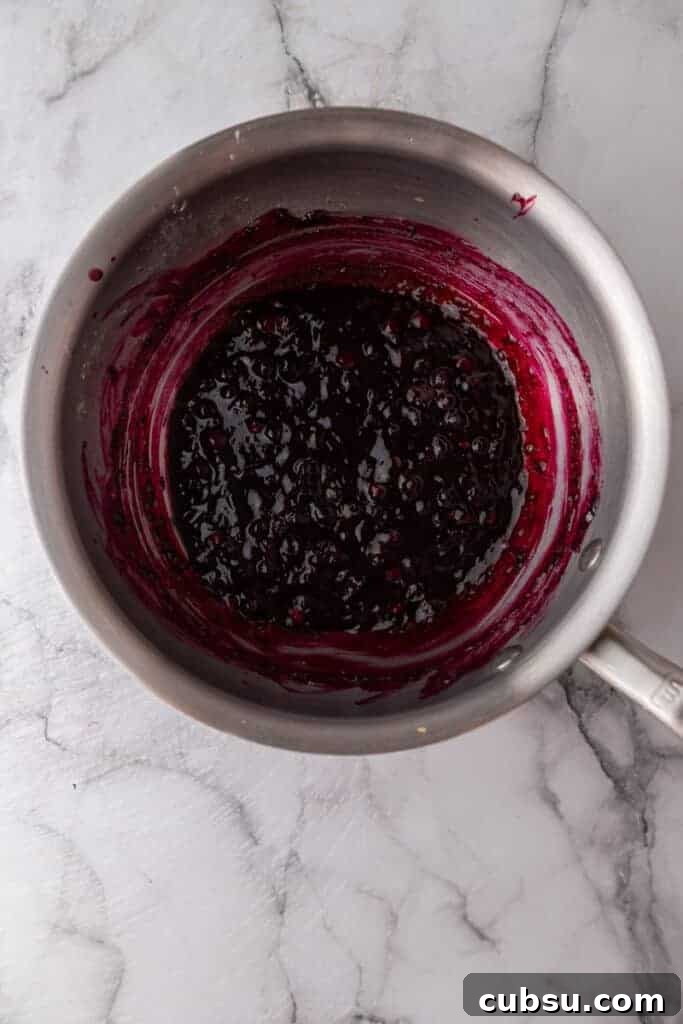 Chewy Blueberry Blondies Recipe with Lemon Glaze 6 mixed fruit ingredients in a pot