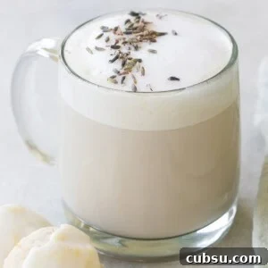 London Fog Latte: Creamy Earl Grey Tea with Vanilla and Lavender 7 London fog tea drink with foamy milk and dried lavender over the top.