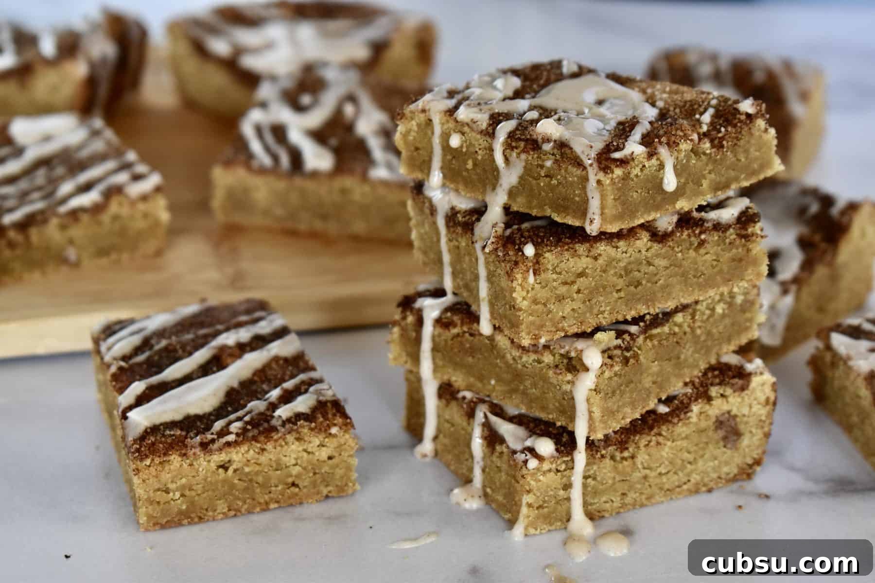 Chewy Cinnamon Sugar Blondies Recipe for Perfect Texture 3 Cinnamon Sugar Blondies stacked high.