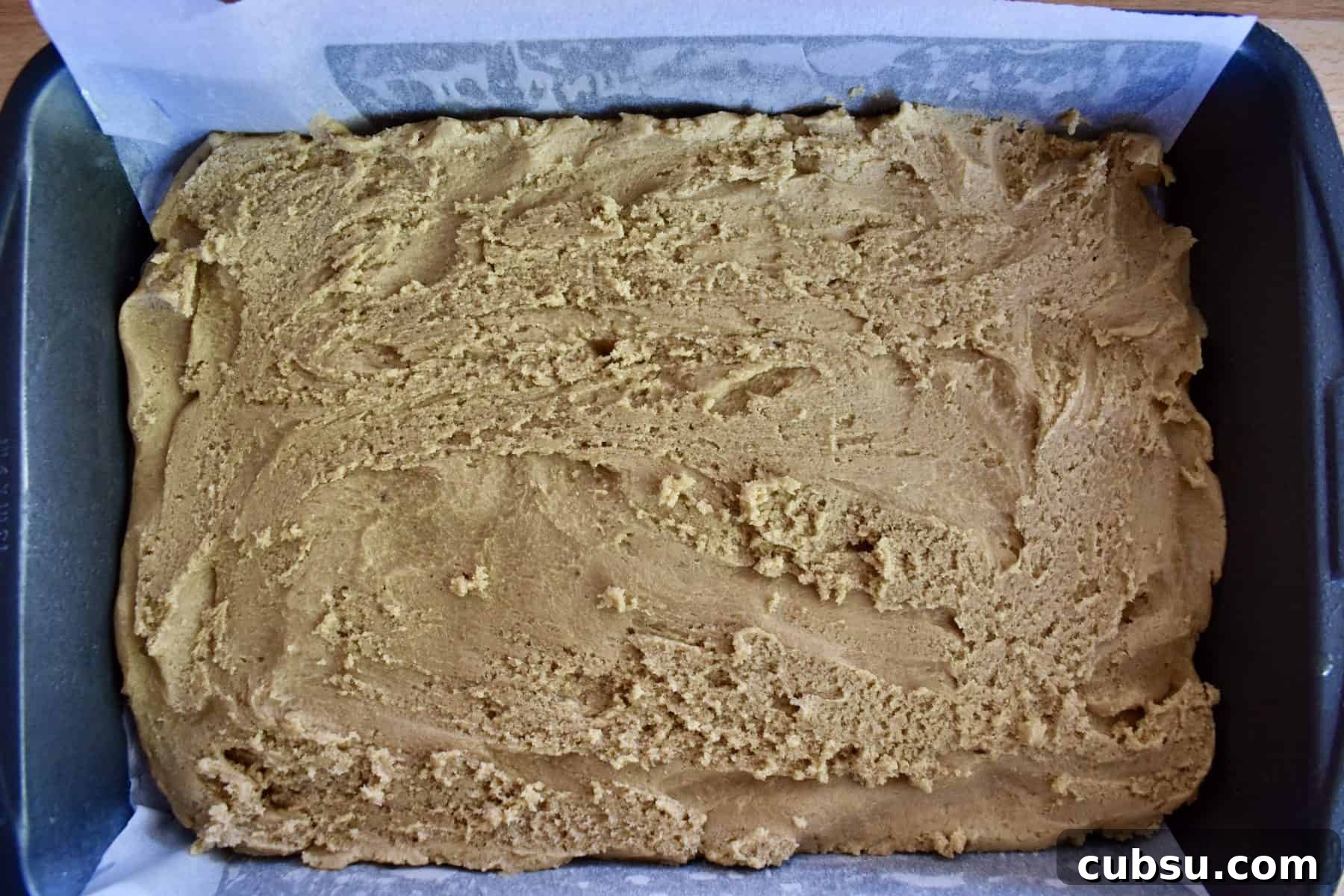 Chewy Cinnamon Sugar Blondies Recipe for Perfect Texture 5 batter spread into the bottom of prepared baking pan.