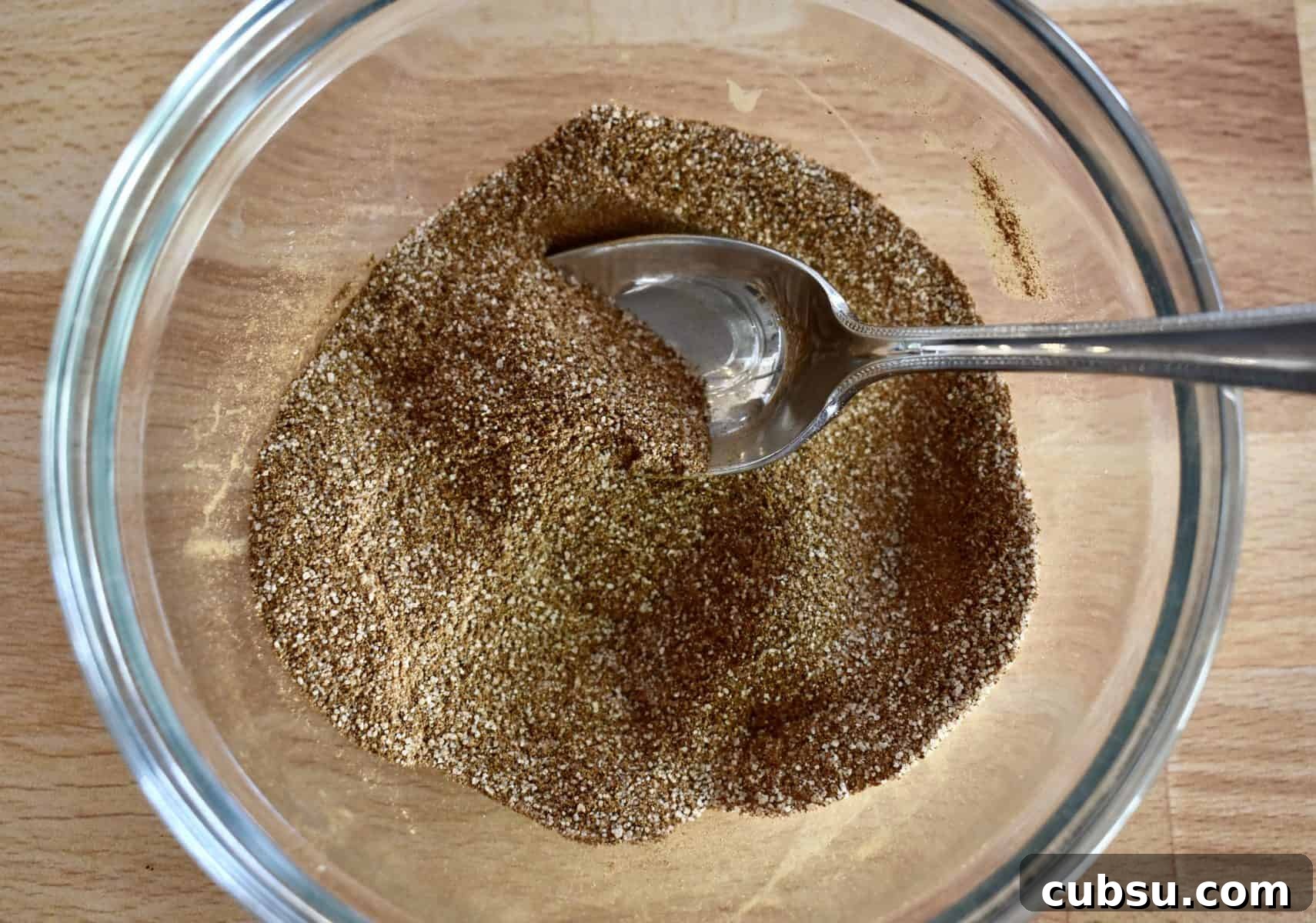 Chewy Cinnamon Sugar Blondies Recipe for Perfect Texture 6 cinnamon and sugar mixed together in a small glass bowl.