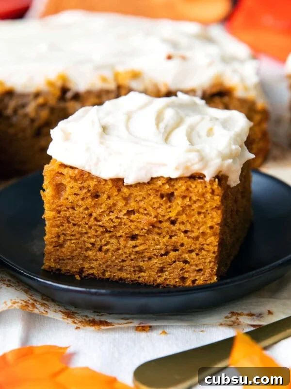 Classic Buttermilk Pound Cake Recipe with Tender Crumb 8 A slice of easy pumpkin cake served on a plate with lots of frosting