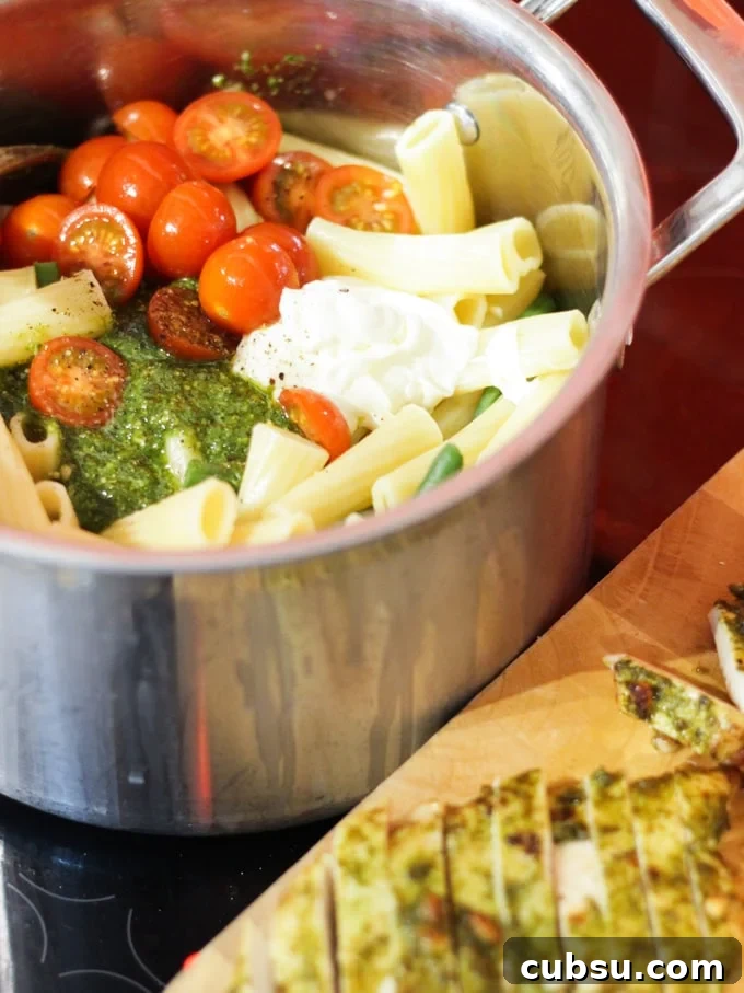 tomatoes and creme fraiche in a saucepan to make sauce