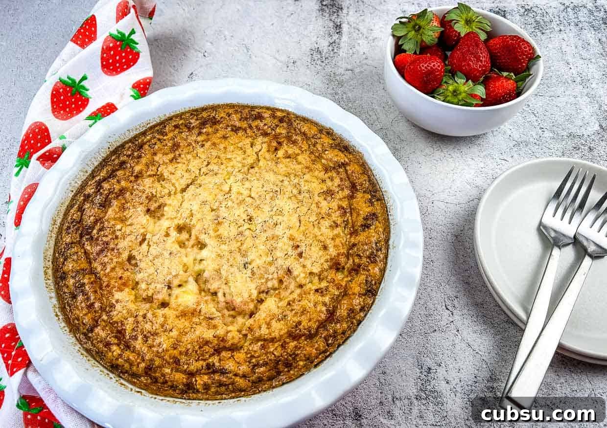 31 Classic Comfort Recipes That Keep Families Coming Back 24 Slices of Ham & Cheese Impossible Quiche next to a whole pie.
