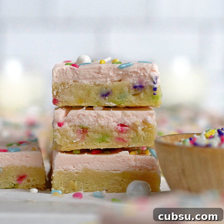 stack of three sugar cookie bars with sprinkles