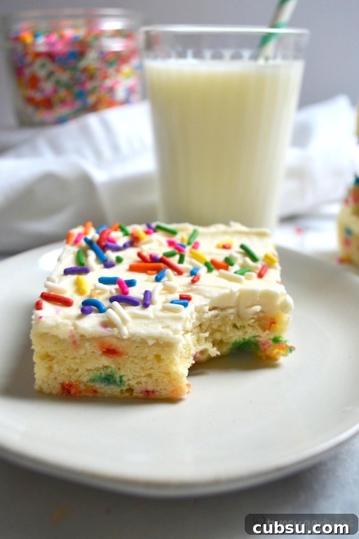 Cream Cheese Sugar Cookie Bars — Soft Frosted Dessert Bars 15 Cookie bar on a plate