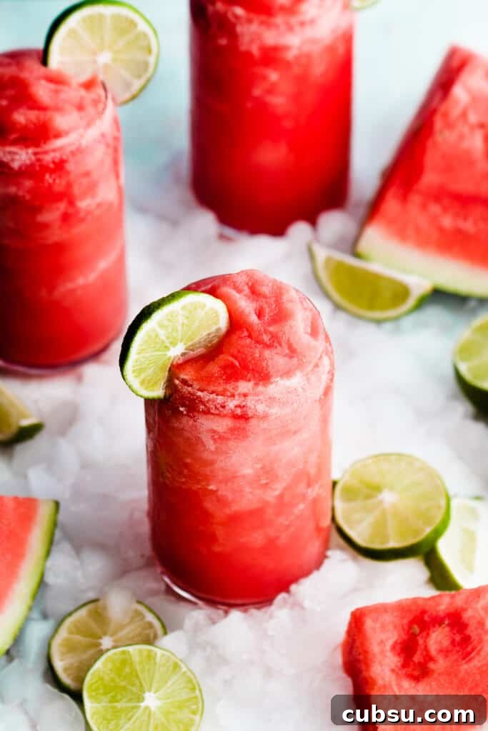 A top-down view of three glasses of the bright pink drinks.