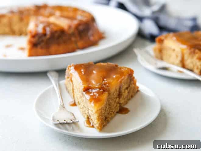 closeup of slice of caramel apple upside down cake