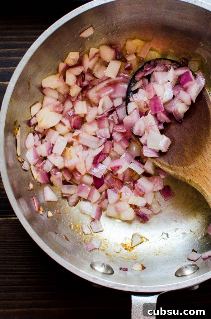 sweating red onions until soft and sweet.