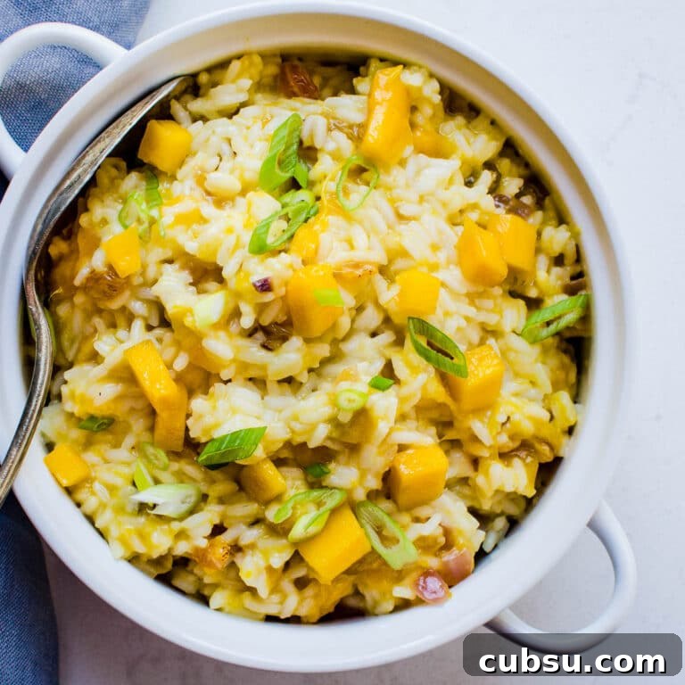 coconut mango rice side dish in a serving bowl.