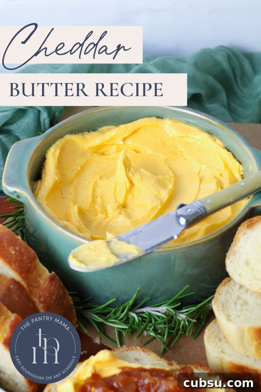 Cheddar butter in a serving bowl with text overlay for Pinterest Pin image.