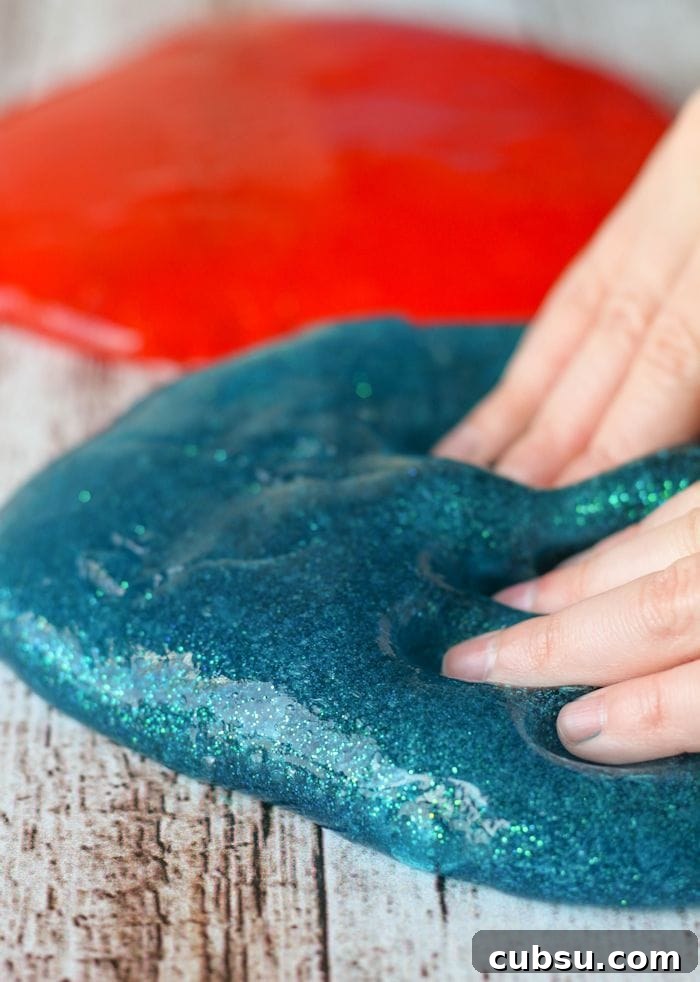 Homemade Glitter Gak recipe - the kids LOVE this stuff!! It takes a minute to make and provides hours of entertainment. All you need to make this is water, elmers glue, borax, and glitter! Recipe on { lilluna.com }
