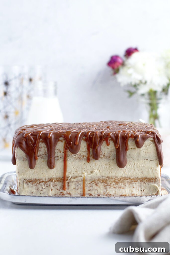 semi naked cake with a chocolate and caramel drip
